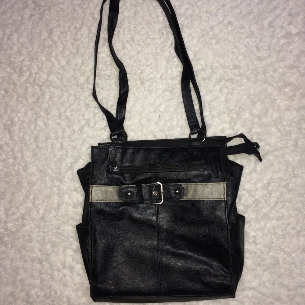 black leather fringe backpack Fringe backpack with pockets and side fringes in black